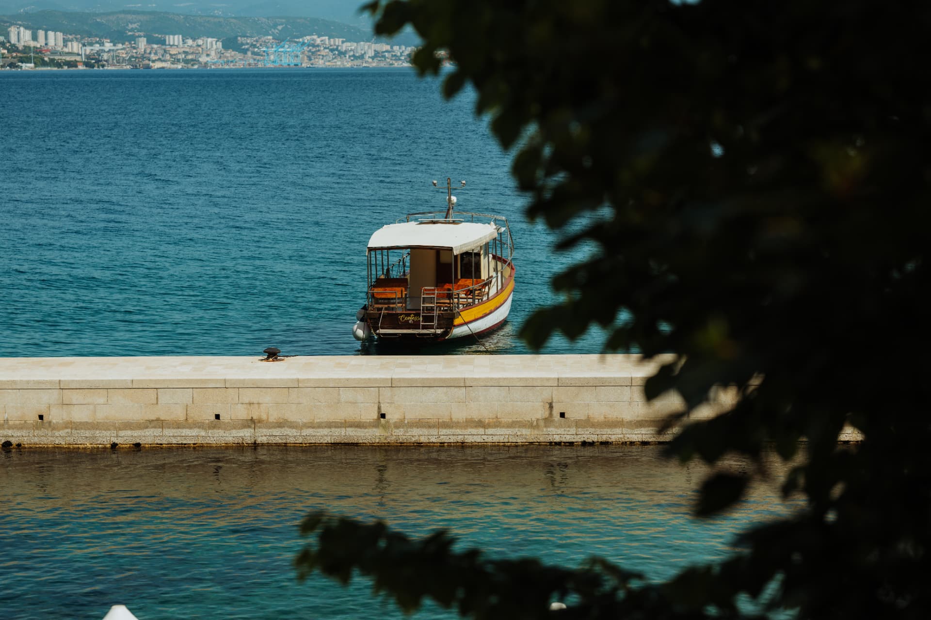 Traditional boat on the Adriatic Sea in Opatija, Croatia – destination wedding location photographed by Nemanja Potkonjak